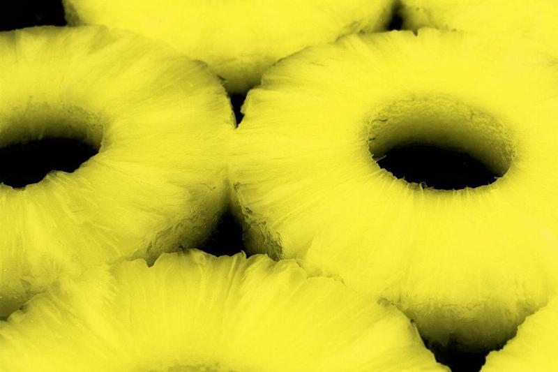 pineapple 540199081 Pineapple slices on black background