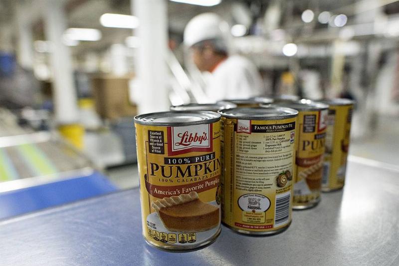 pumpkin 455188136 Cans of Libby's Pumpkin sit on a packaging machine