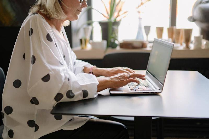 Woman Typing Older woman typing