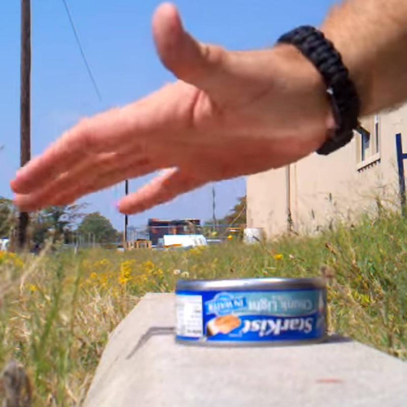 man about to open a can without a can opener