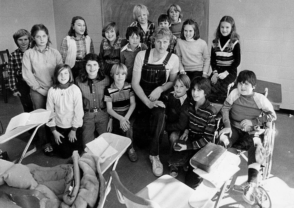 Larry Bird and local children