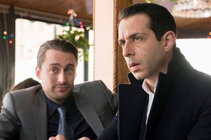 Kieran Culkin and Jeremy String sitting at diner table in Succession Kieran Culkin and Jeremy String sitting at diner table in Succession