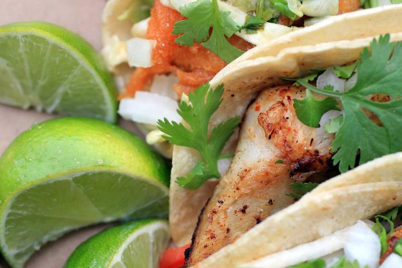 Baja Fish Tacos baja fish tacos. Spicy tempura-battered cod w/ chipotle slaw