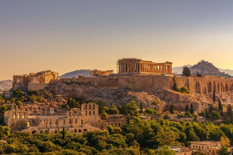 Parthenon and surrounding cliffs in Athens, Greece