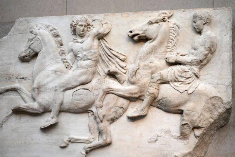 BRITAIN-GREECE-DIPLOMACY-HISTORY-ARCHAEOLOGY Visitors view the Parthenon Marbles, also known as the Elgin Marbles, at the British Museum in London on January 9, 2023.