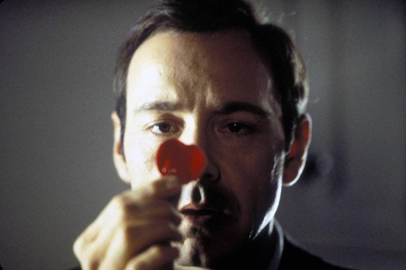 Kevin Spacey looking at heart-shaped lollipop as Lester Burnham in American Beauty Kevin Spacey looking at heart-shaped lollipop as Lester Burnham in American Beauty