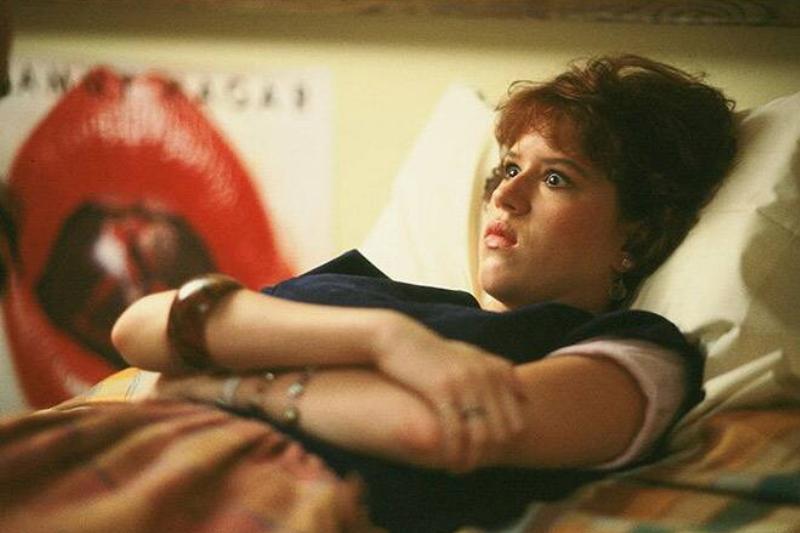 Molly Ringwald laying in bed as Samantha in Sixteen Candles Molly Ringwald laying in bed as Samantha in Sixteen Candles