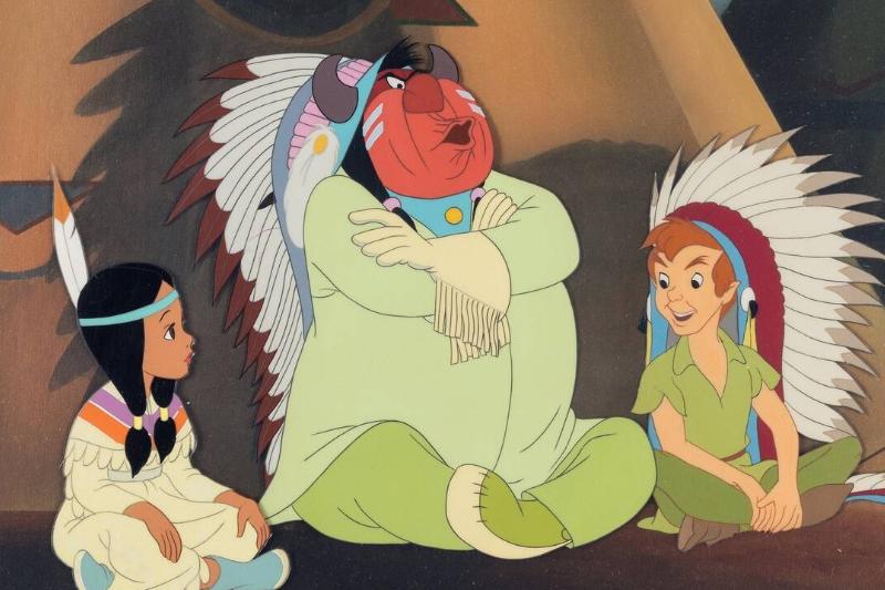 Tiger Lily and her father sitting next to Peter Pan in Native American headdress Tiger Lily and her father sitting next to Peter Pan in Native American headdress