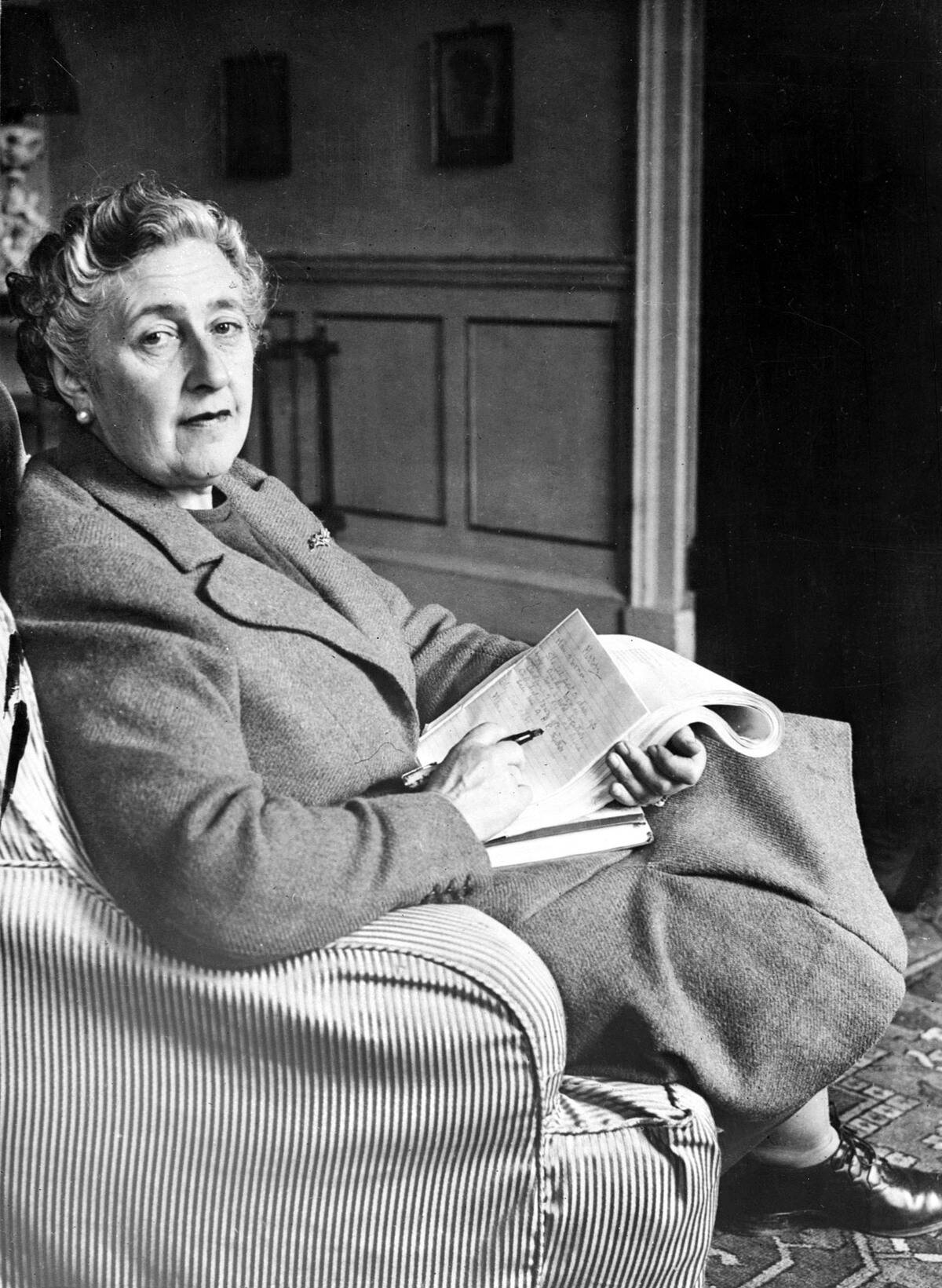 English writer Dame Agatha Christie, pos