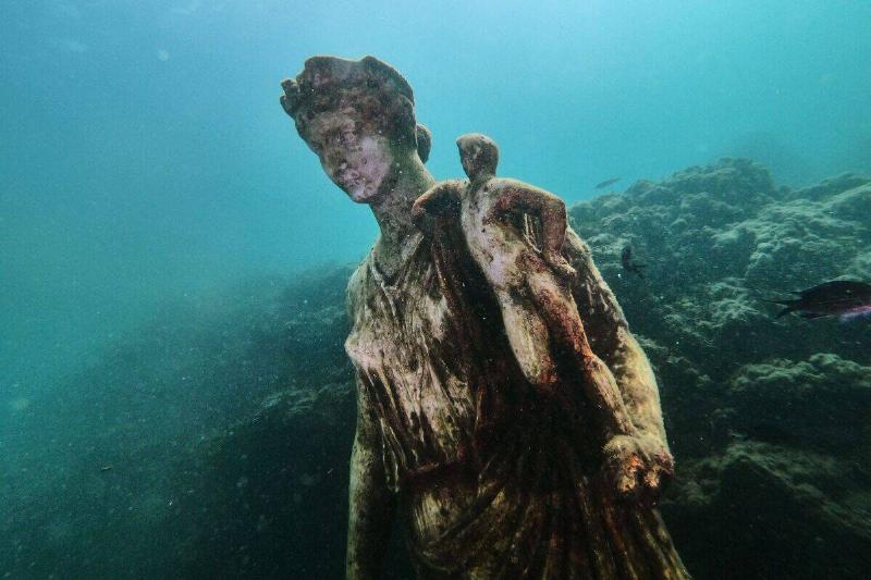 underwater statue from ancient Roman city underwater statue from ancient Roman city