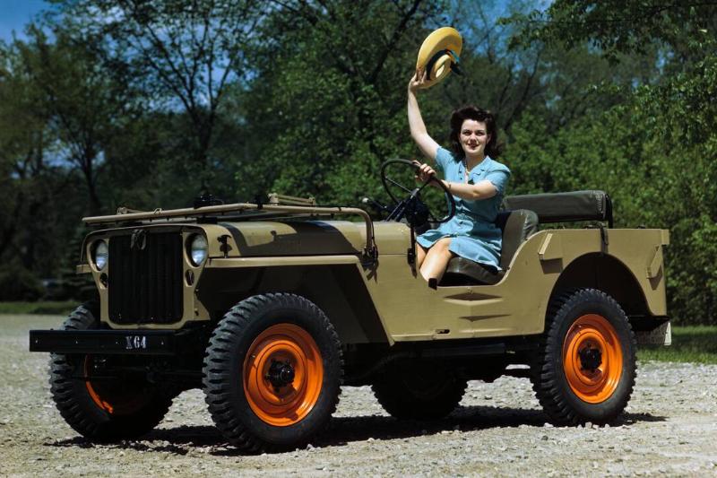 Woman Driving a Military Jeep Woman Driving a Military Jeep