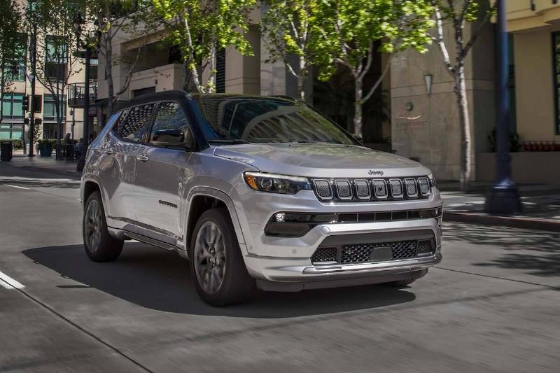 2024-jeep-compass-driving-front-angle-carbuzz-1083519-1600