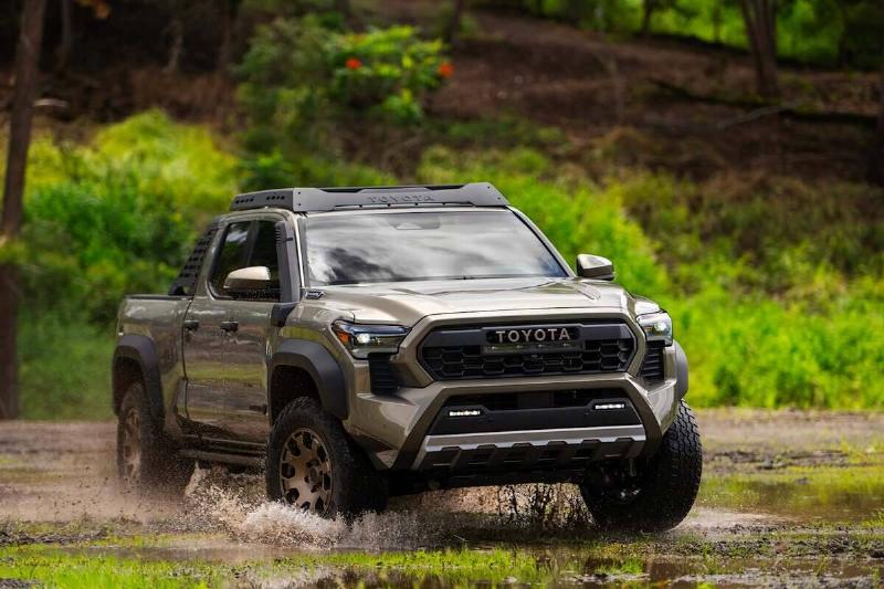 2024-toyota-tacoma-driving-front-angle-carbuzz-1138154-1600 2024-toyota-tacoma-driving-front-angle-carbuzz-1138154-1600