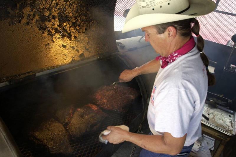 View Of Pitmaster Duke Bischoff At BBQ World Headquarters