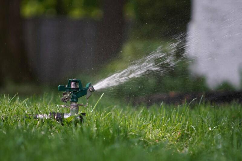 Sprinkler going off in a yard