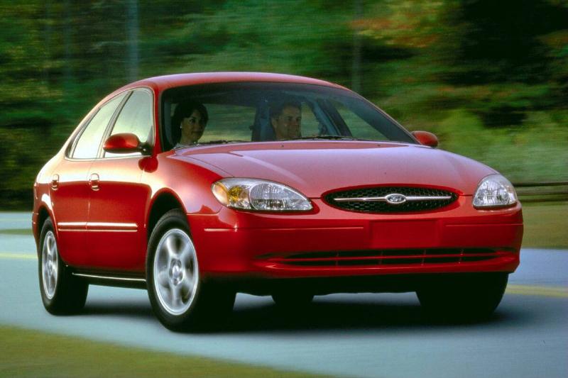 Ford Taurus driving along a road
