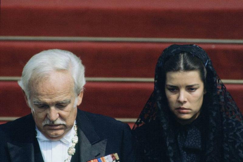 Prince Rainier and Caroline walking down steps