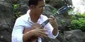 This man can play the ukulele.