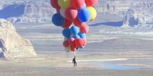 David Blaine nonchalantly floating over Arizona holding 52 helium balloons.