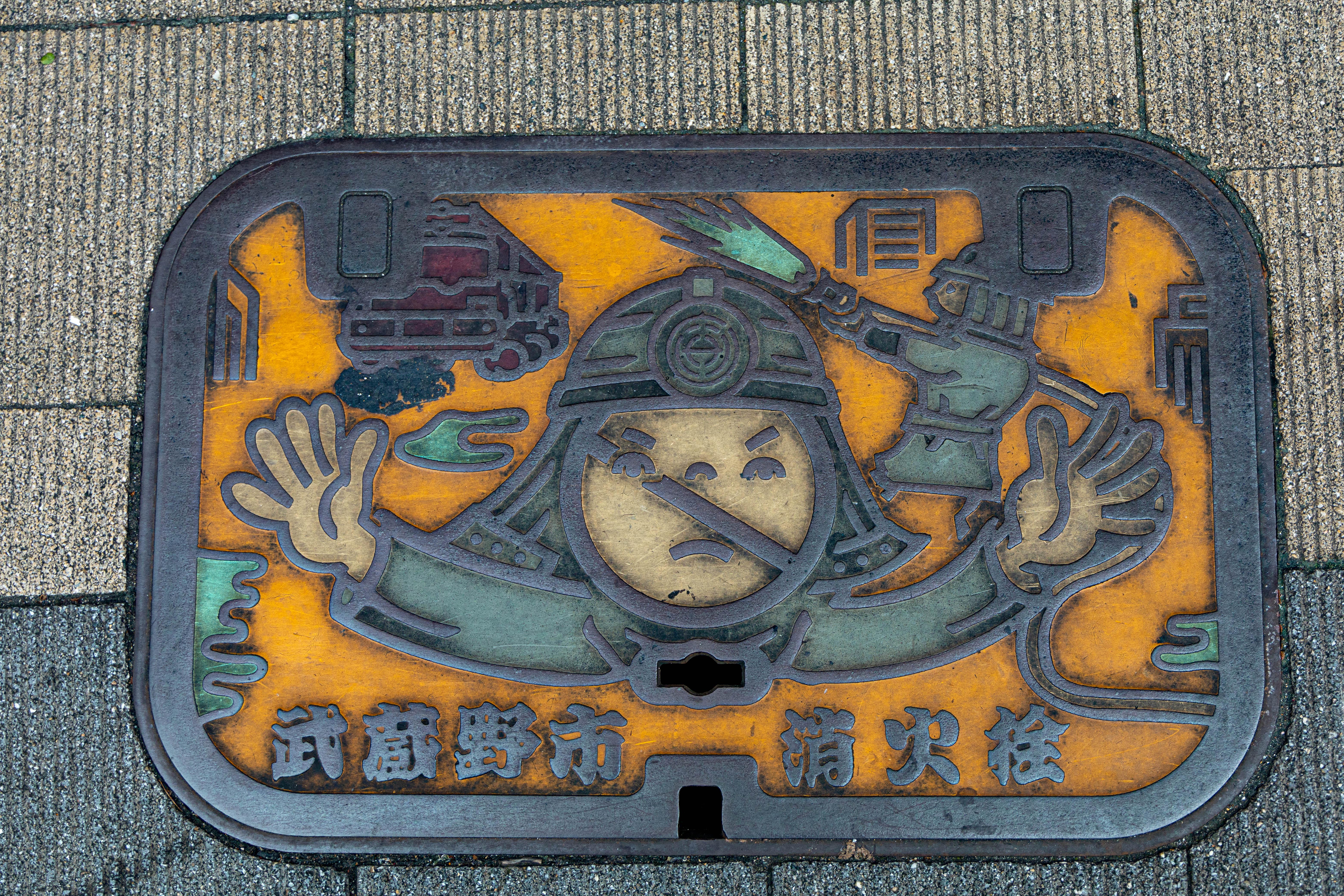 The fire hose covers in Tokyo are neat.