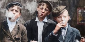 Paperboys on smoke break, circa 1910