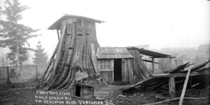 Three bedroom tree stump house in Vancouver, ~1900,