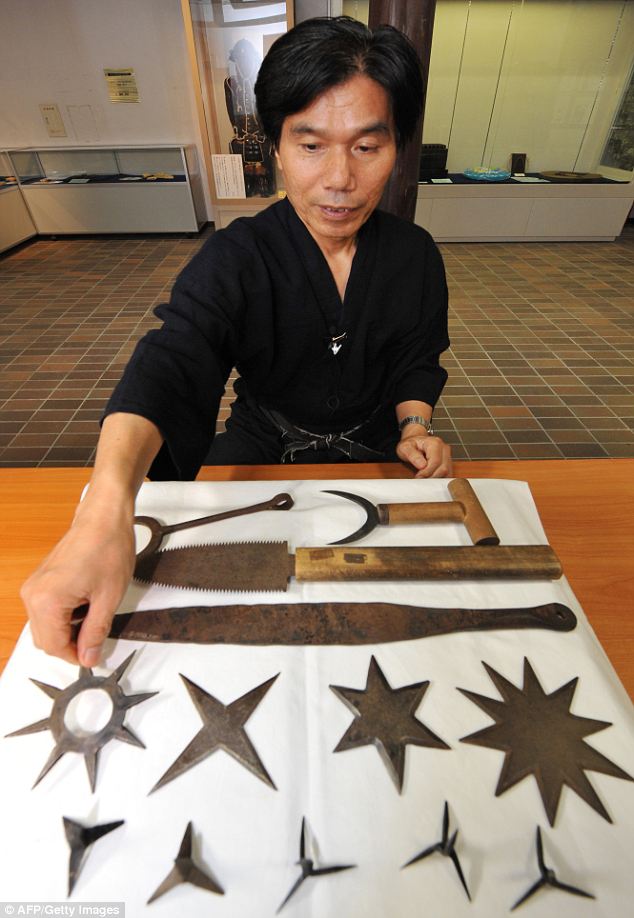 Jinichi Kawakami, Japan's last ninja, showing his tools of the trade.