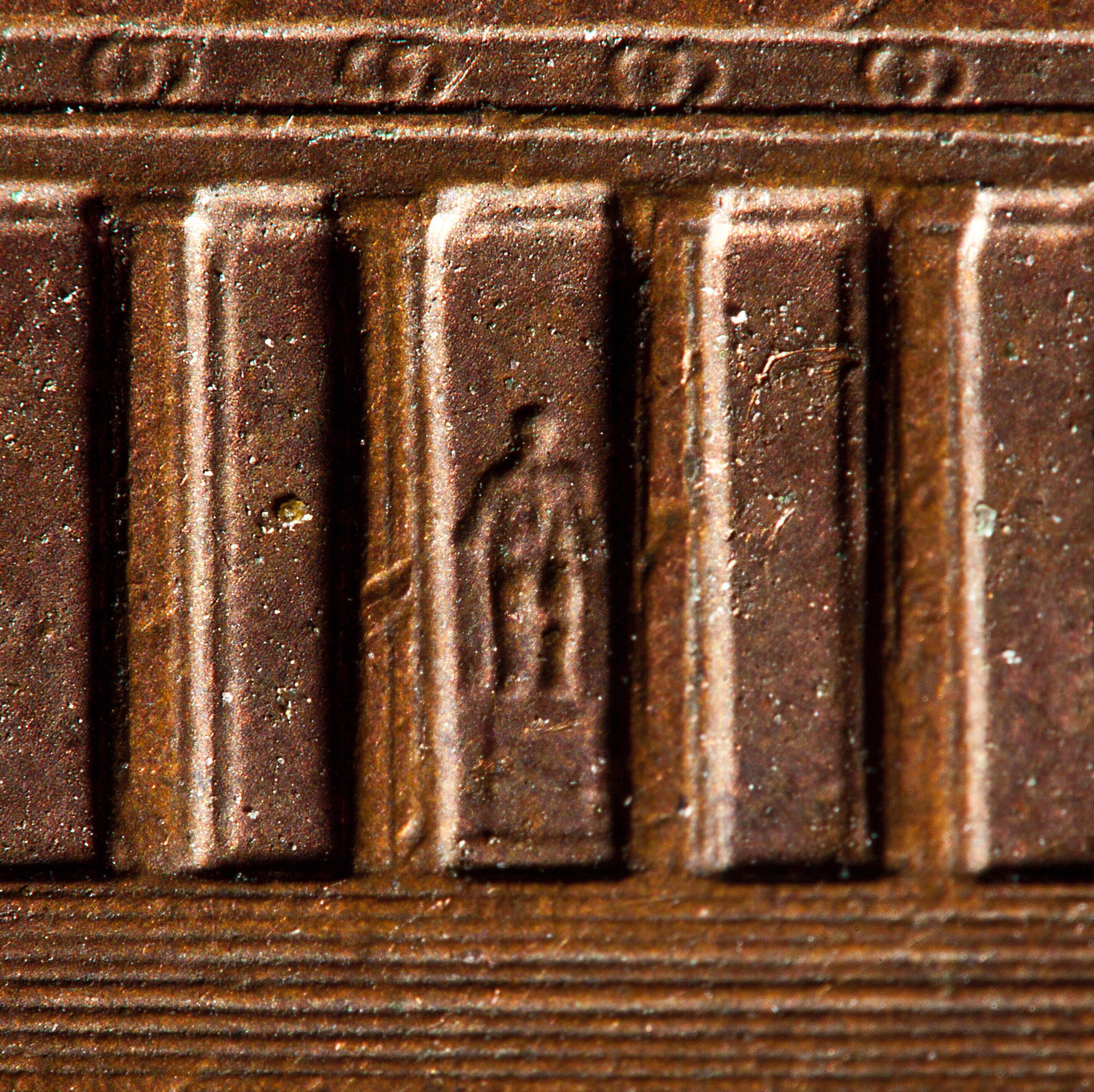 The super-smol Abe Lincoln on the back of a US penny
