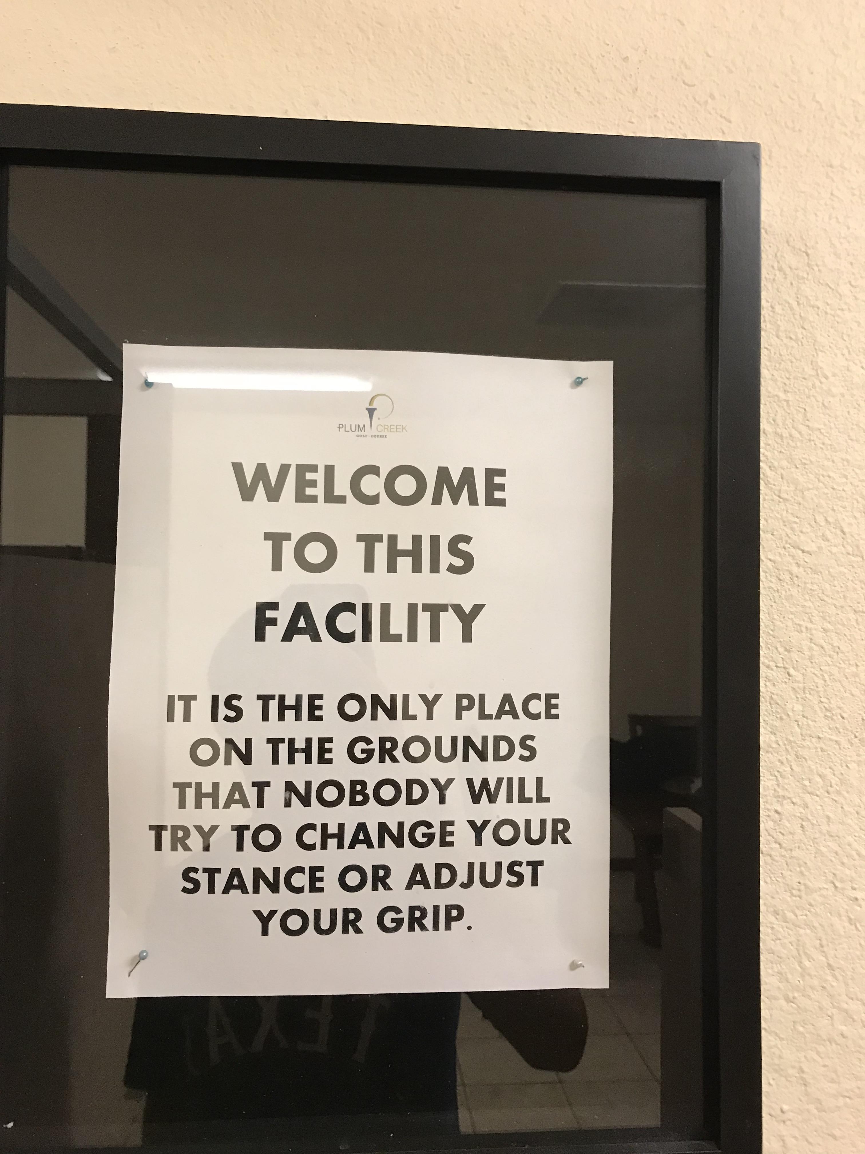 In the men's restroom at the golf course