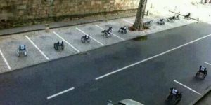 Brilliant protest in Lisbon, Portugal. Wheelchair parked with notes on them "be right back" "just getting something"