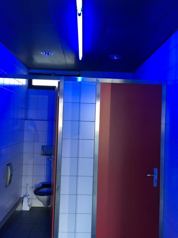 In Switzerland public restrooms are lit with blue lights so junkies can’t find their veins