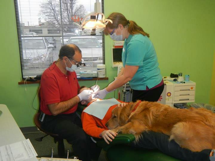 Dog helps little boy get over his fear at the dentist.