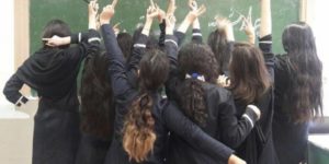 Iranian girls to the regime in Iran and its compulsory hijab rules.