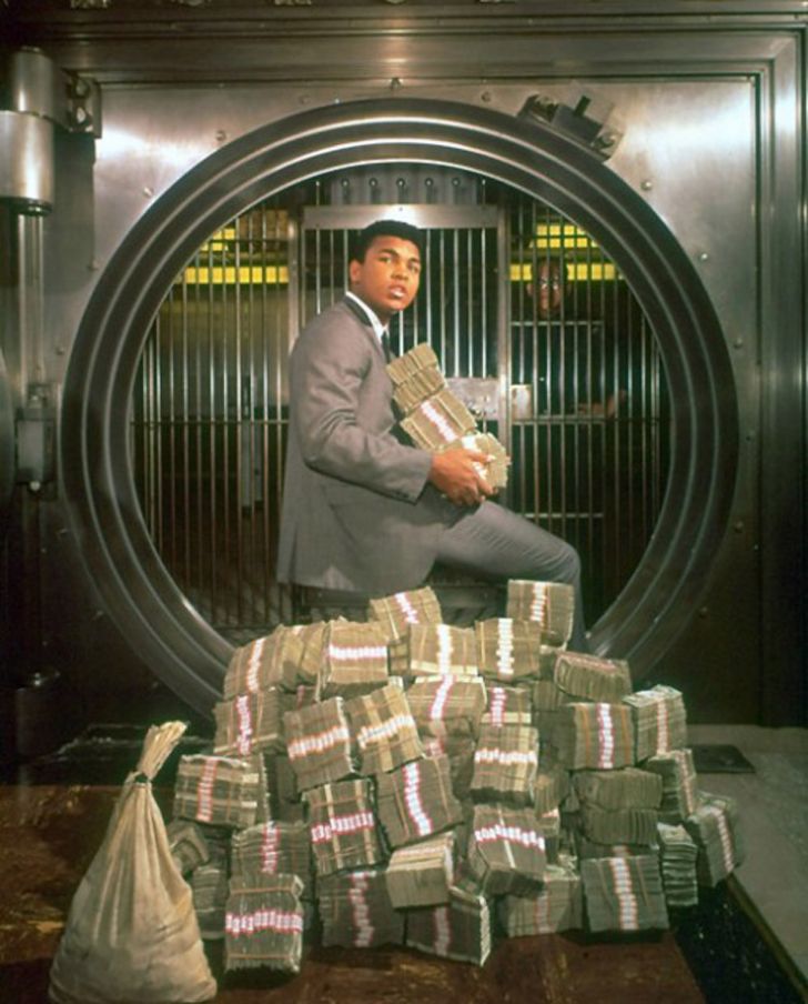 Muhammad Ali with his winnings in 1964.