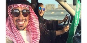 Saudi man teaching his wife how to drive.