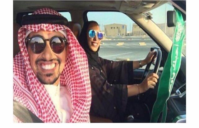 Saudi man teaching his wife how to drive.