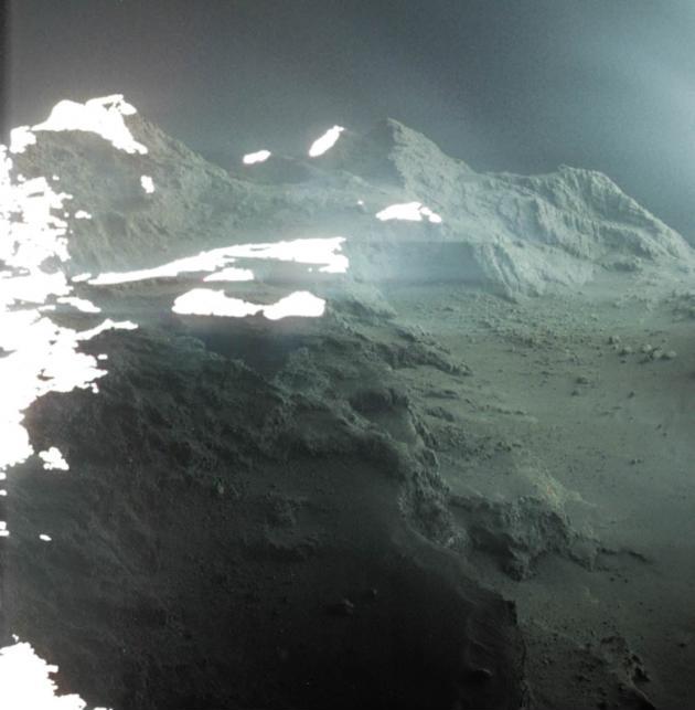 This is a real photo of the surface of a comet.