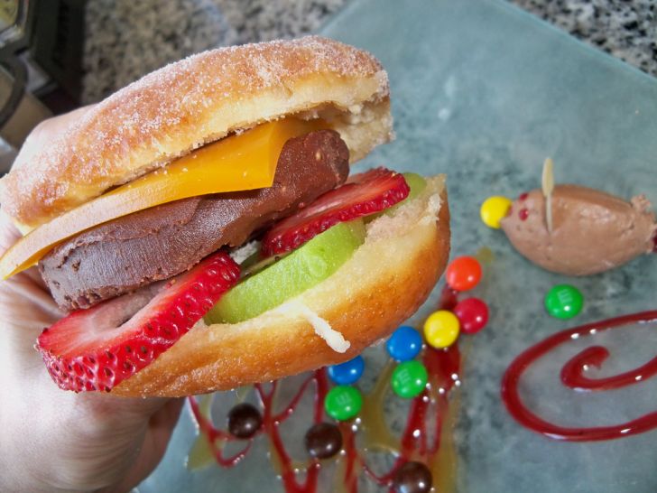 Nutella Burger '“ warm donut, Nutella mousse, passion fruit gelatin, fresh strawberries and kiwi.