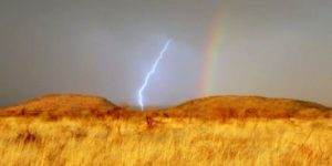 Seeing lightning and rainbow at the same time in Africa.