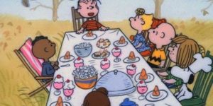 Charlie Brown had Franklin sitting alone on his own side of the table for Thanksgiving in a lawn chair.