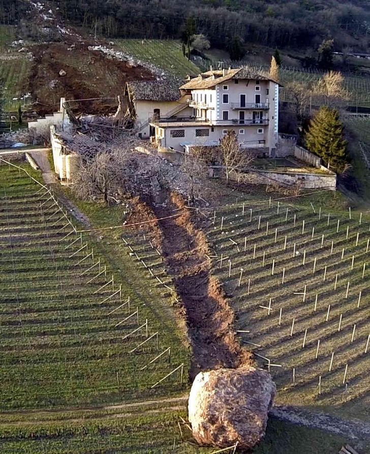 Here's a boulder that rolled through a house in Italy.