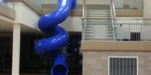 This school has a twirly slide to get downstairs!