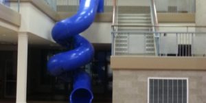 This school has a twirly slide to get downstairs!