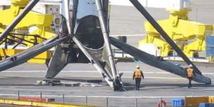 SpaceX landing is even more impressive when you see the booster next to humans.