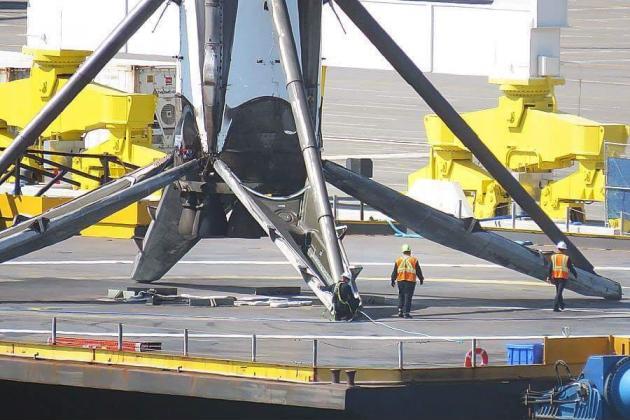SpaceX landing is even more impressive when you see the booster next to humans.
