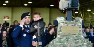 Child says final goodbye to his mother after the USAF Pavehawk crash in England last week.