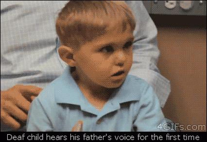 A deaf child hears his father's voice for the first time