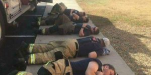 Firefighters napping after 30 hours of fighting Tennessee wildfire.