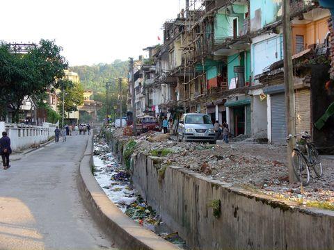 This is the border between India and Bhutan. India is on the right