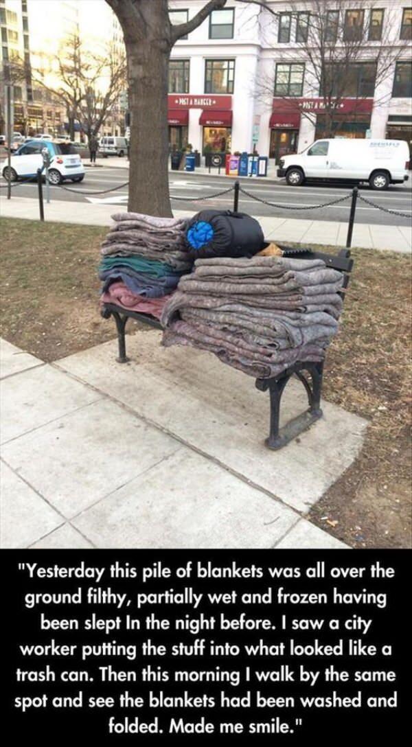 A city worker washes and folds these blankets for the homeless.